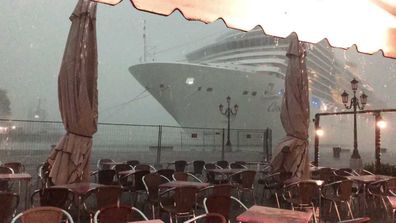 A close call for the Costa Deliziosa, as the liner loses control during a storm and nearly collides with a Venice dock.