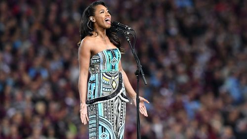 Paulini sings the National Anthem prior State of Origin Game 3 between the Queensland Maroons and NSW Blues, at Suncorp Stadium in Brisbane (AAP)