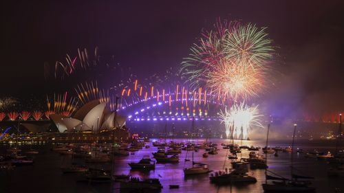 REFILE HIGH RES. The New Years Eve Fireworks in Sydney Harbour as seen from Mrs Macquaries Point in Sydney on January 1, 2021. Photo: Dominic Lorrimer