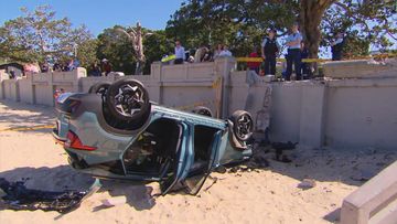 Car crashes onto Balmoral Beach