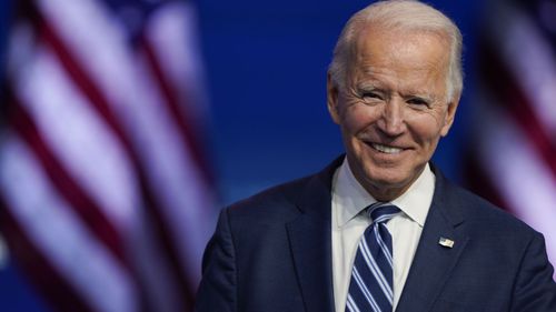 President-elect Joe Biden smiles as he speaks at The Queen theatre in Wilmington, Delaware (Photo: November 10, 2020)