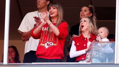 KANSAS CITY, MISSOURI - OCTOBER 22: Taylor Swift and Brittany Mahomes react during a game between the Los Angeles Chargers and Kansas City Chiefs at GEHA Field at Arrowhead Stadium on October 22, 2023 in Kansas City, Missouri. (Photo by Jamie Squire/Getty Images)