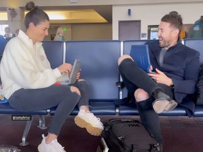 Stephanie Rice and her boyfriend playing video games at the airport