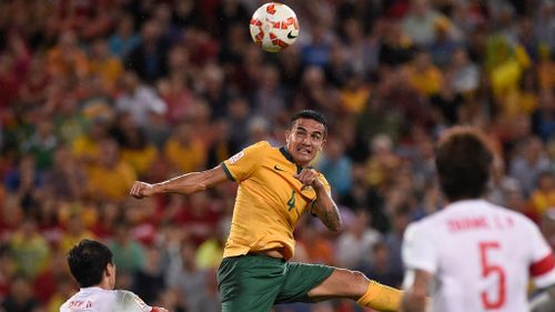 Tim Cahill scores a header for Australia against China in the Asian Cup quarter final in Brisbane. (Getty)