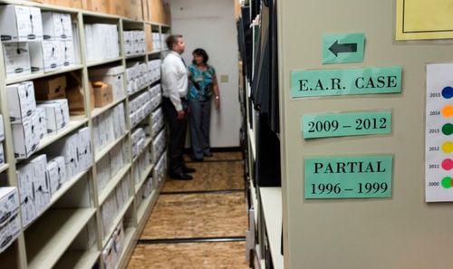 FBI Special Agent Marcus Knutson, left, and Sacramento County Sheriff's Department Deputy Paige Kneeland searching for evidence in the East Area Rapist case . (AAP)