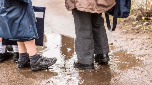 Rainy start to the school term for NSW students