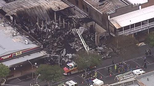 The hotel was destroyed by the blaze. (9NEWS)