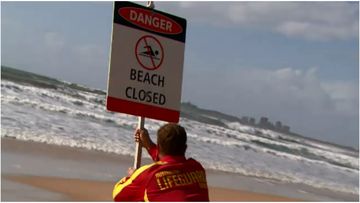 Gold Coast beaches are closed as strong winds whip up dangerous surf.