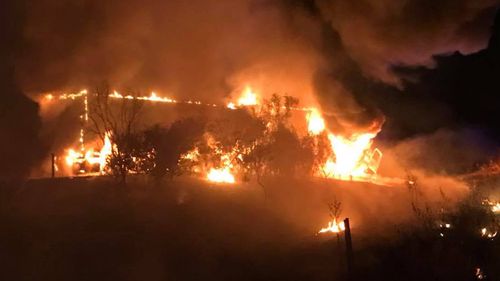 A truck carrying frozen chicken was turned into a flaming inferno north of Albury, on the NSW-Victoria border this morning (Supplied).