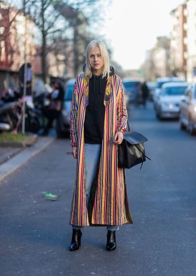 <p>Coats are long, bright and bold with smart, sexy accessories like this one worn by Linda Toll.</p>
<p>Image: Getty.</p>