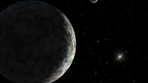An artist's concept of the dwarf planet Eris and its moon Dysnomia. The sun is the small star in the distance.