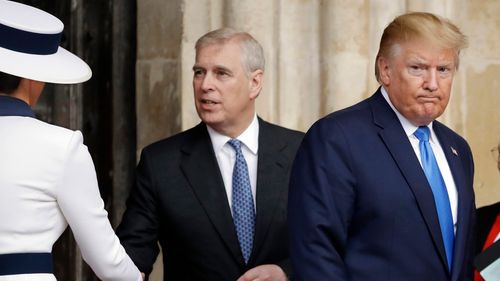 President Donald Trump, right, and first lady Melania Trump, left, accompanied by Britain's Prince Andrew, leave after a tour of Westminster Abbey in London, June 3, 2019.
