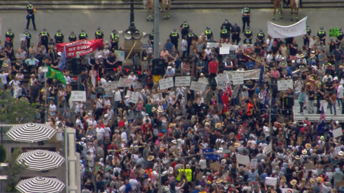 Thousands of protesters have gathered in front of the State Library in Melbourne. 