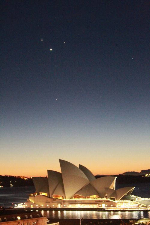 Jupiter, Mercury and Mars sit above the Sydney Opera House in 2011.