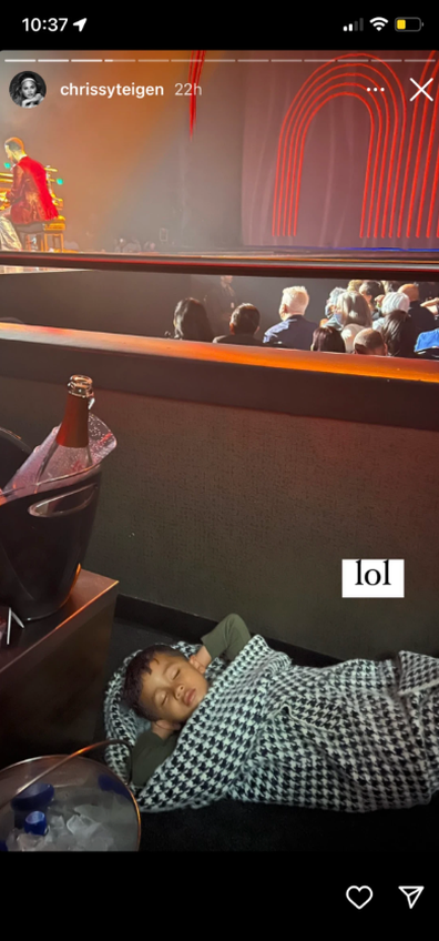 Chrissy Teigen shares adorable snap of son Miles sleeping through dad John Legend's concert.