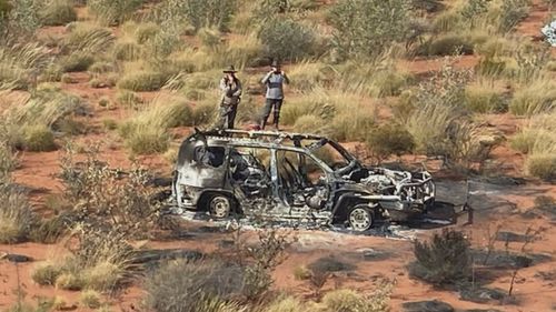 The retirees were on a trip of a lifetime in remote Western Australia when their vehicle exploded into flames.