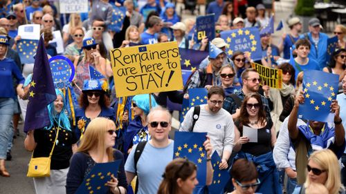 Protesters rally in defiance of Brexit