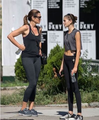 <p>Cindy Crawford and her mini-me Kaia Gerber  share more than just glossy
locks, high cheekbones and <em><a href="https://style.nine.com.au/2018/01/09/12/16/kaia-gerber-vogue-fashion-style-paris" target="_blank" draggable="false">Vogue </a></em><a href="https://style.nine.com.au/2018/01/09/12/16/kaia-gerber-vogue-fashion-style-paris" target="_blank" draggable="false">covergirl status.<br />
</a><br />
The mother-daughter duo also appear  to share a love of rigorous workouts and coordinated
activewear.<br />
<br />
Yesterday, the supermodels&rsquo; were pictured on the streets of
New York City sporting makeup-free faces, slicked back hair and black-and-grey activewear.</p>
<p>Further proof that the best way to complete a head-to-toe
athleisure look is with a designer bag, Crawford was pictured with a Gucci Soho
purse slung across her waist.<br />
<br />
As <a href="https://style.nine.com.au/2018/05/08/10/01/cindy-crawford-met-gala-2018-versace" target="_blank" title="one of the most coveted models of the '90s" draggable="false">one of the most coveted models of the '90s</a>, the former
Versace and
Pepsi muse is no stranger to staying in shape. <br />
<br />
"I started working out when I was 20 years old because I
needed to get fit,&rdquo; Crawford told <em><a href="https://www.thecut.com/2017/11/cindy-crawford-workout-diet-routine-beauty-interview.html" target="_blank" draggable="false">The Cut</a></em><a href="https://www.thecut.com/2017/11/cindy-crawford-workout-diet-routine-beauty-interview.html" target="_blank" draggable="false">.</a> "In a weird way, it&rsquo;s been great for
me because working out, having a trainer, getting a facial once a month &mdash; those
things never felt extravagant because they felt like part of my job. They just
felt like me taking care of my instrument."<br />
<br />
With her 17-year-old offspring<a href="https://style.nine.com.au/2017/10/05/11/23/kaia-gerber-fashion-week-model-paris" target="_blank" title=" ruling the runways forChanel, Fendi and Alexander Wang" draggable="false"> ruling the runways for Chanel, Fendi and Alexander Wang</a>, the apple doesn&rsquo;t appear to fall far from the
fitness tree.<br />
<br />
"The good thing is that she (Kaia) has grown up with seeing
how I take care of myself, so I don&rsquo;t really have to say that much to her," said Crawford.<br />
<br />
"I have to live by example. I just went with her on her
first fashion season and I think the only advice I gave her was that you can
only sleep five or six hours one night or two nights in a row. It&rsquo;s cumulative
&mdash; take the time to catch up on your sleep and have alone time."<br />
<br />
Take a leaf out of Cindy and Kaia&rsquo;s style book with our pick
of the ten must-have activewear pieces to add to
your wardrobe this spring.</p>