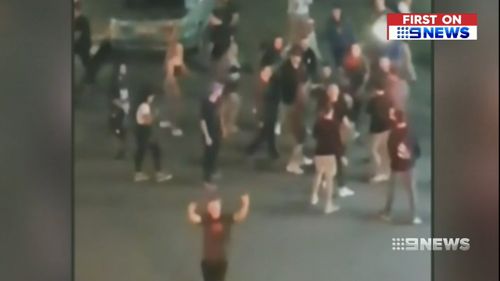 "F--k the police" people were filmed yelling. (9NEWS)