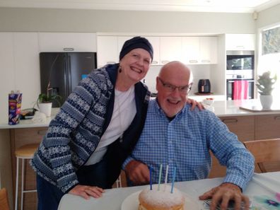 Patricia Curnow with her husband after losing her hair during cancer treatment.