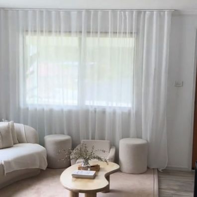 TikToker Mrs Gillick shows how she transformed her living room with Kmart's Sicily S-fold curtains