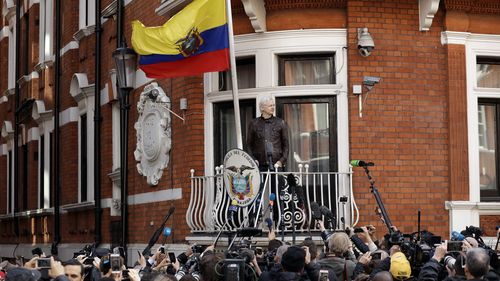 WikiLeaks founder Julian Assange gestures on the balcony of the Ecuadorian embassy prior to speaking, in London, Friday May 19, 2017. The British government on Friday, June 17, 2022 ordered the extradition of WikiLeaks founder Julian Assange to the United States to face spying charges. He is likely to appeal. 