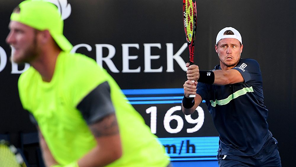 Australian Open: Lleyton Hewitt, Sam Groth win through in doubles second round