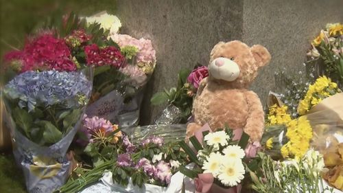 Flowers and toys have been left at the scene of the deadly crash in Daylesford.
