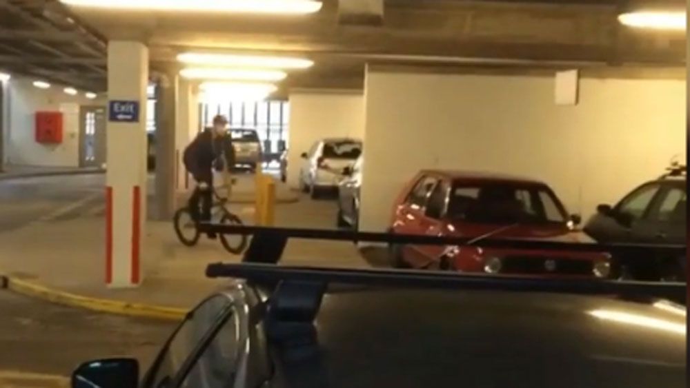 BMX rider attempts ridiculous car park stunt