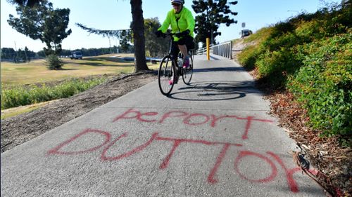 Slurs against Peter Dutton have been sprayed on a footpath in his electorate.