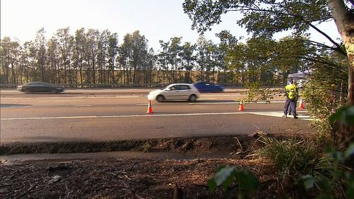 Police were immediately called to the scene and forensics officers began to investigate the surrounding area next to Homebush Bay Drive. Picture: 9NEWS.