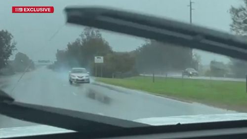 Images from the scene show smoke coming from a front wheel 