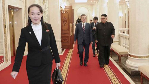 Kim Yo Jong walks ahead of South Korean President Moon Jae-in and North Korean leader Kim Jong Un, right, arrive at the headquarters of the Central Committee of the Workers' Party in Pyongyang, North Korea.