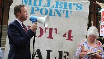 Greens member for Balmain Jamie Parker joins community campaigners in a rally outside state parliament, criticising state government's sale of public housing. (AAP)
