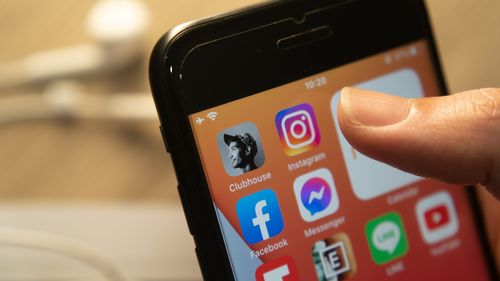Bangkok, Thailand - February 15, 2021 : iPhone 7 showing its screen with popular social networking applications which are Clubhouse, Instagram and Facebook.