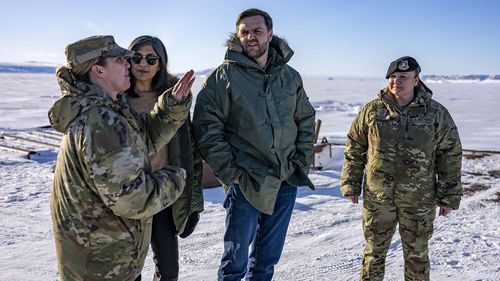 US Vice President JD Vance and his wife Usha Vance listen to Pituffik Space Base commander Colonel Susan Meyers during a tour on March 28, 2025 in Pituffik, Greenland. 