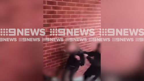 Students have filmed as a 13-year-old girl is attacked by a fellow pupil in Bega. Source: 9News