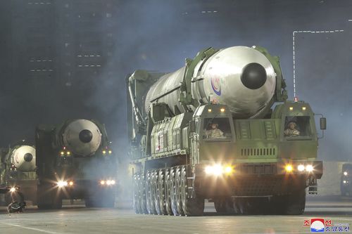 A Hwasong-17 ICBM was one of the new weapons on display. It has been labelled by Pyongyang as one of its greatest military achievements yet. Theoretically the ICBM could put the entire US mainland in range of a North Korean nuclear warhead, but analysts say there are questions over whether the missile can deliver a nuclear payload on target. North Korea claims it successfully tested the missile in March, adn described the launch as a "powerful nuclear war deterrent".  