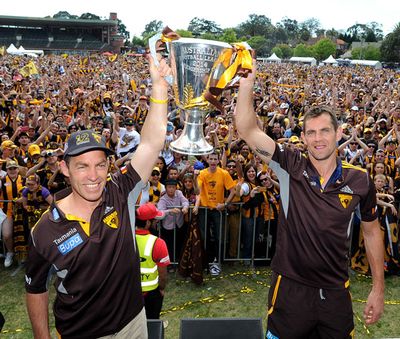 <b>After pulverising Sydney to claim back-to-back flags at the MCG on Saturday, Hawthorn's stars enjoyed the spoils of victory, celebrating at a special fans' day on Sunday.</b><br/><br/>Thousands of adoring Hawks supporters decked out in gold and brown packed into the club's spiritual home at Glenferrie Oval to salute the 22 players as they were presented on stage with the the AFL Grand Final Cup and their winning medals dangling around their necks.<br/><br/>Check out or gallery of Hawthorn's day of delight.