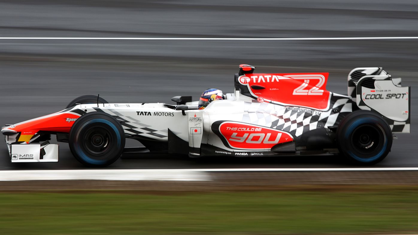 Daniel Ricciardo in action for HRT at the 2011 British Grand Prix.