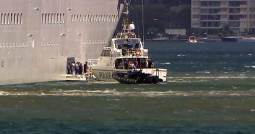 The Pacific Explorer asked NSW Police Marine Area Command to escort the group from the ship. (9NEWS).