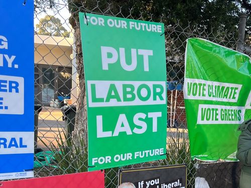 Labor is seeking an injunction over "Put Labor Last" signs appearing in Higgins, designed to look like they were placed by the Greens but allegedly from the Liberal Party.