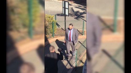 Mr Robertson was caught on camera hurling abuse at Muslim worshipers in Brisbane.