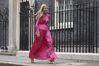 Outgoing British Prime Minister Boris Johnson's wife Carrie walks outside Downing Street as he prepares to deliver a speech, in London, Tuesday, Sept. 6, 2022. (Justin Tallis/Pool Photo via AP)