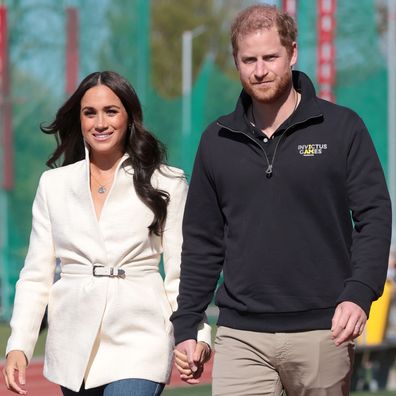 Prince Harry, Duke of Sussex and Meghan, Duchess of Sussex attend the Athletics Competition during day two of the Invictus Games The Hague 2020 at Zuiderpark on April 17, 2022 in The Hague, Netherlands. (Photo by Chris Jackson/Getty Images for the Invictus Games Foundation)