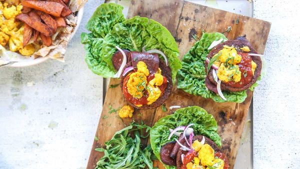 Smokey barbecue burger with baked cauliflower, 'bacon' and wedges