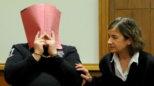 German nurse jailed for life for murder of 30 patients