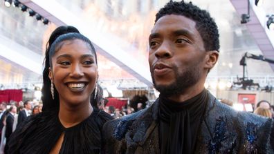 Taylor Simone Ledward gives an emotional tribute to her late husband Chadwick Boseman at the Gotham Awards. Seen here, the couple attends the 91st Oscars on February 24, 2019, in Hollywood, California.
