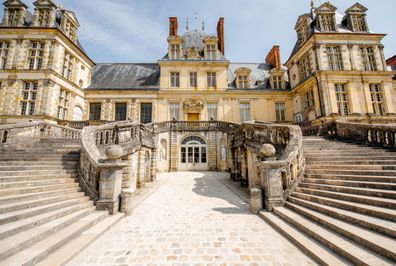 View on the famous staircase in palace of Fontainebleau located on the southeast of Paris in France