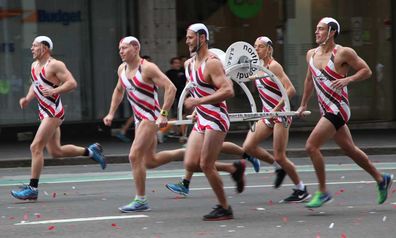 Runners take part in the 2014 City 2 Surf road race